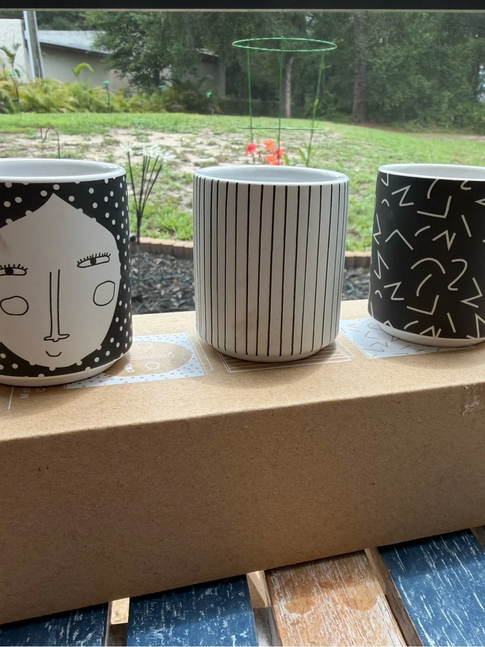OYOY Egg People set of three Ceramic Egg Holder - Black & White